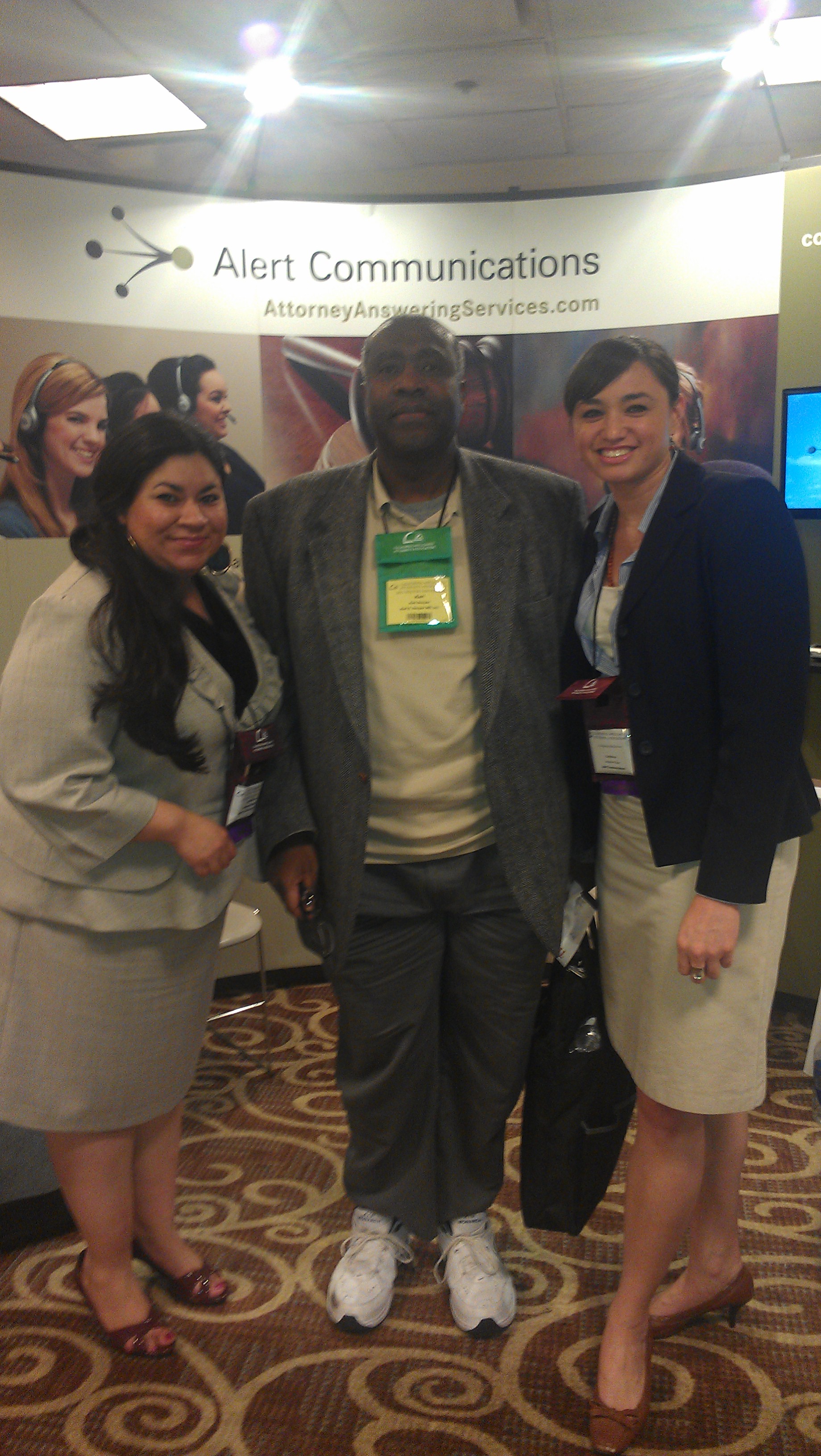 Nancy Vallejo and Amanda Ah Sue with Alert Client Dr. Karl Douyon