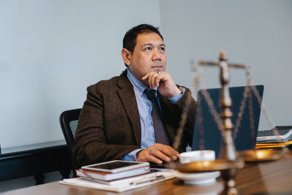 legal virtual assistant working at his desk
